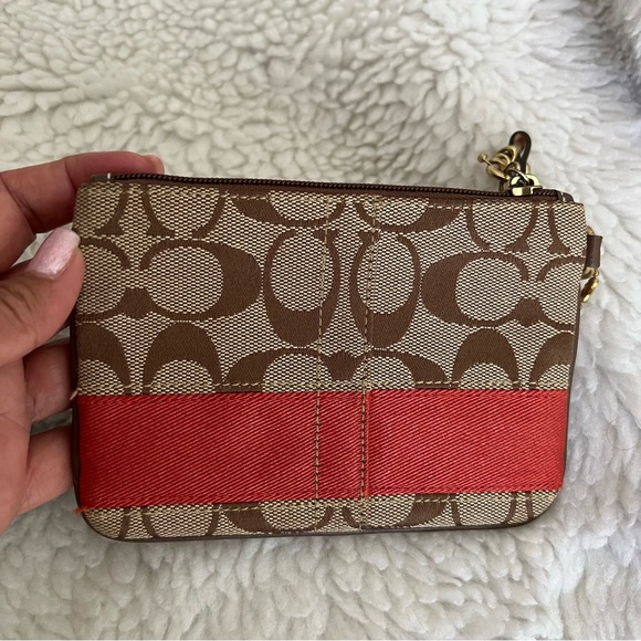Coach Signature Brown and Red Wristlet GUC (Good Used Condition). - Picture 4 of 9